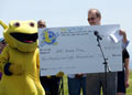 Sammy the Slug presents the 2010 Reunion Challenge check for $250,000, Day by the Bay, April 17, 2010.